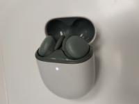 CS503/2024  GREEN HEADPHONES IN WHITE CASE